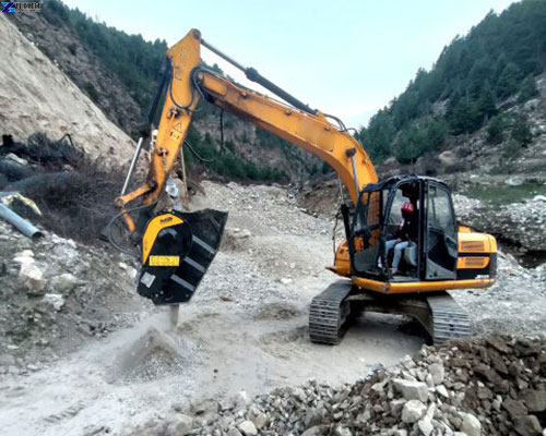 excavator rock crusher bucket work scene excavator rock crusher bucket work scene