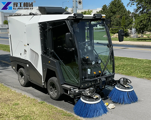 street sweeper vehicle is working street sweeper vehicle is working